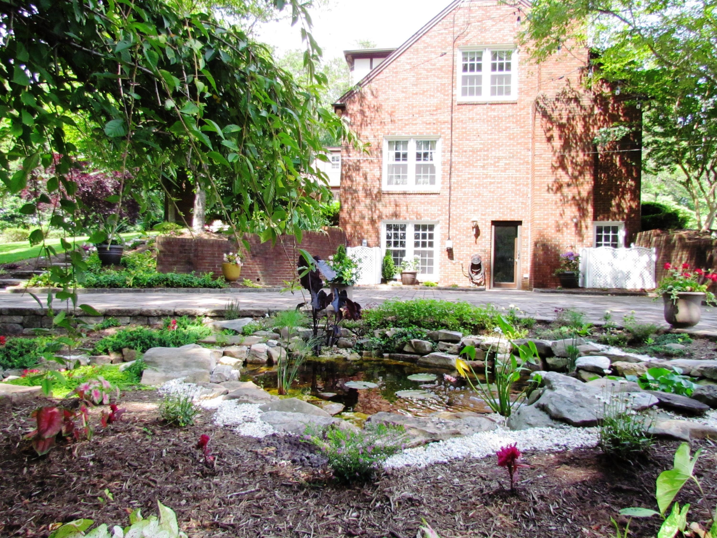 291 Robin Hood Road Bassett, VA 24055 - Photo 16 of 54 Flower Garden Waterfall & Patio