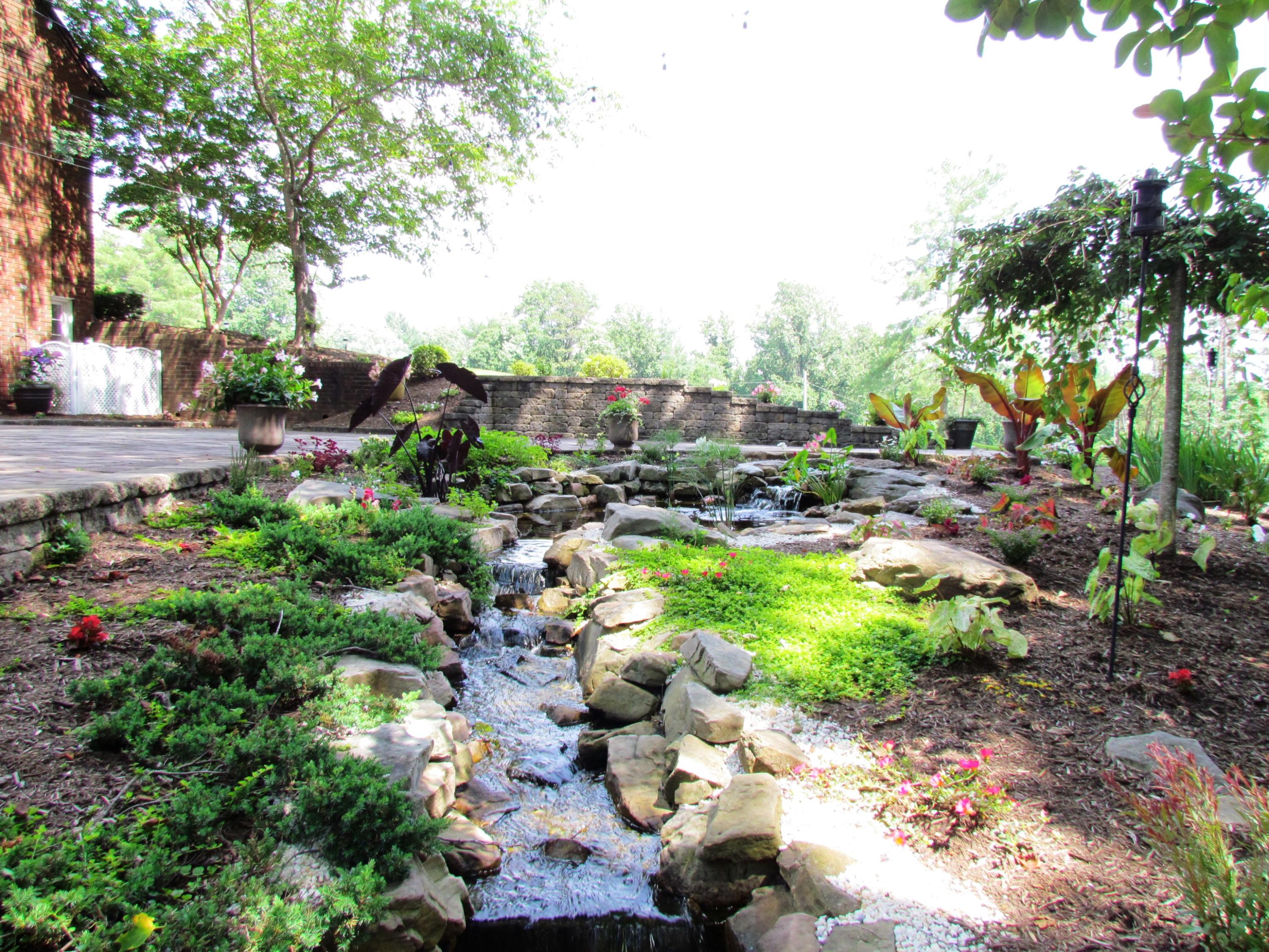 291 Robin Hood Road Bassett, VA 24055 - Photo 44 of 54 Waterfall & Flower Garden..