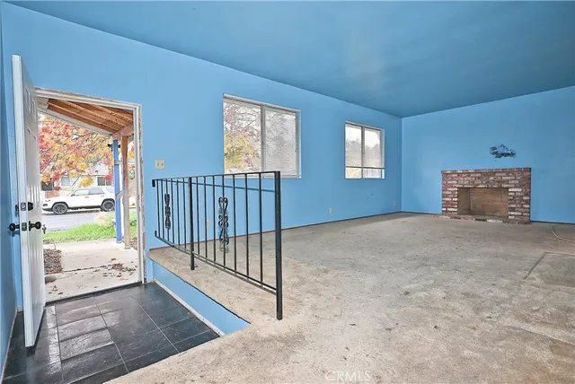 an empty room with windows