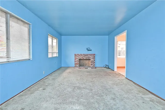 a view of empty room with a window