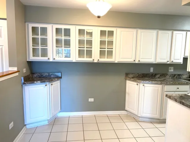 a view of a kitchen with a sink