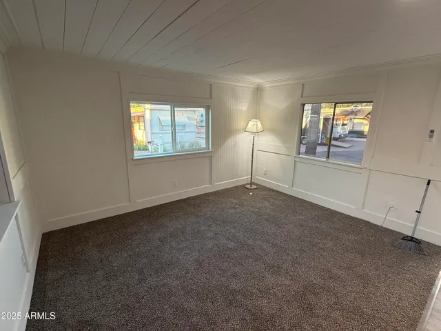 an empty room with windows