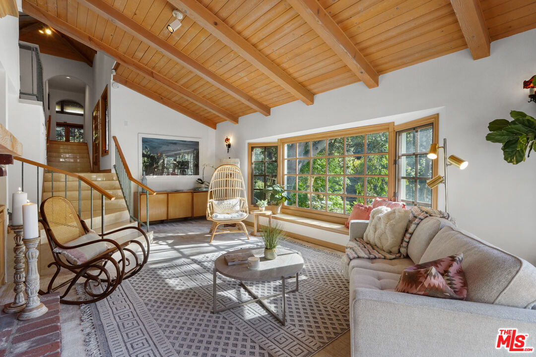 964 Old Topanga Canyon Road Topanga, CA 90290 - Photo 12 of 75 a living room with furniture and a large window