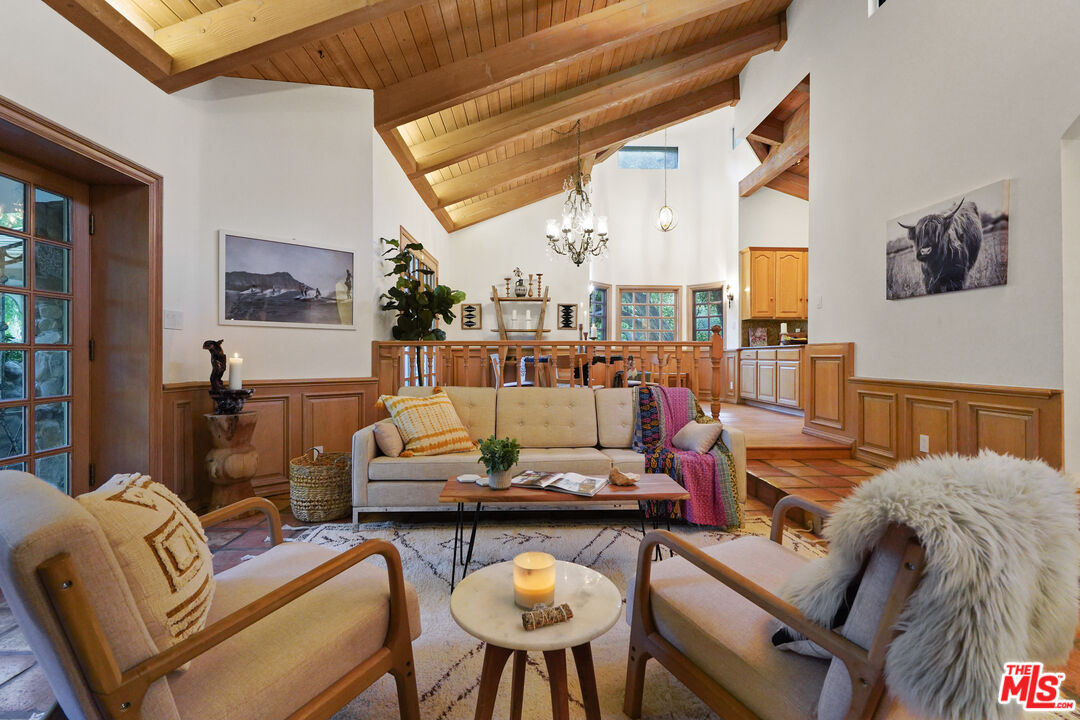 964 Old Topanga Canyon Road Topanga, CA 90290 - Photo 20 of 75 a living room with furniture and a large window