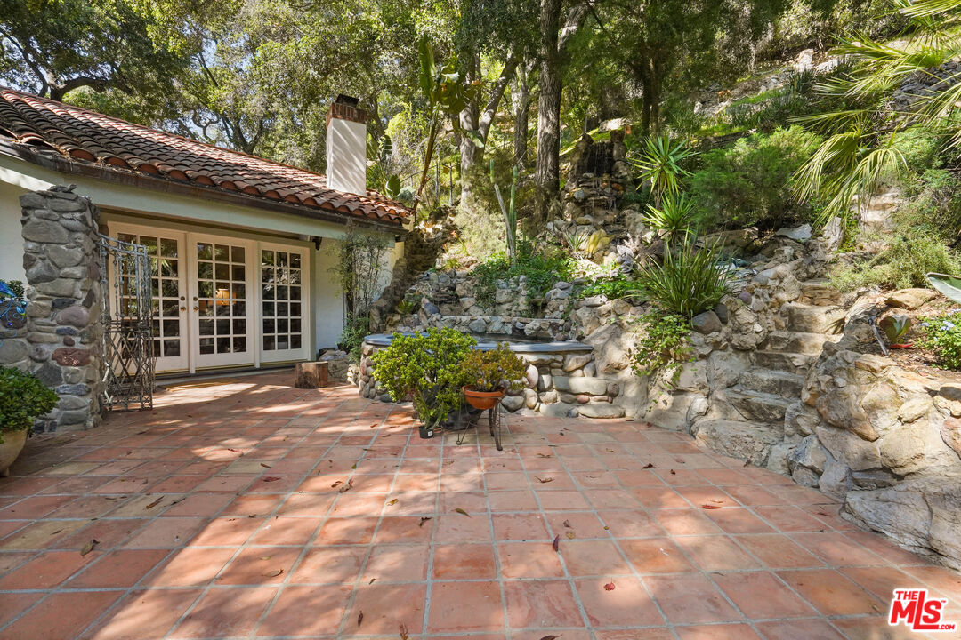 964 Old Topanga Canyon Road Topanga, CA 90290 - Photo 23 of 75 a view of a house with a backyard
