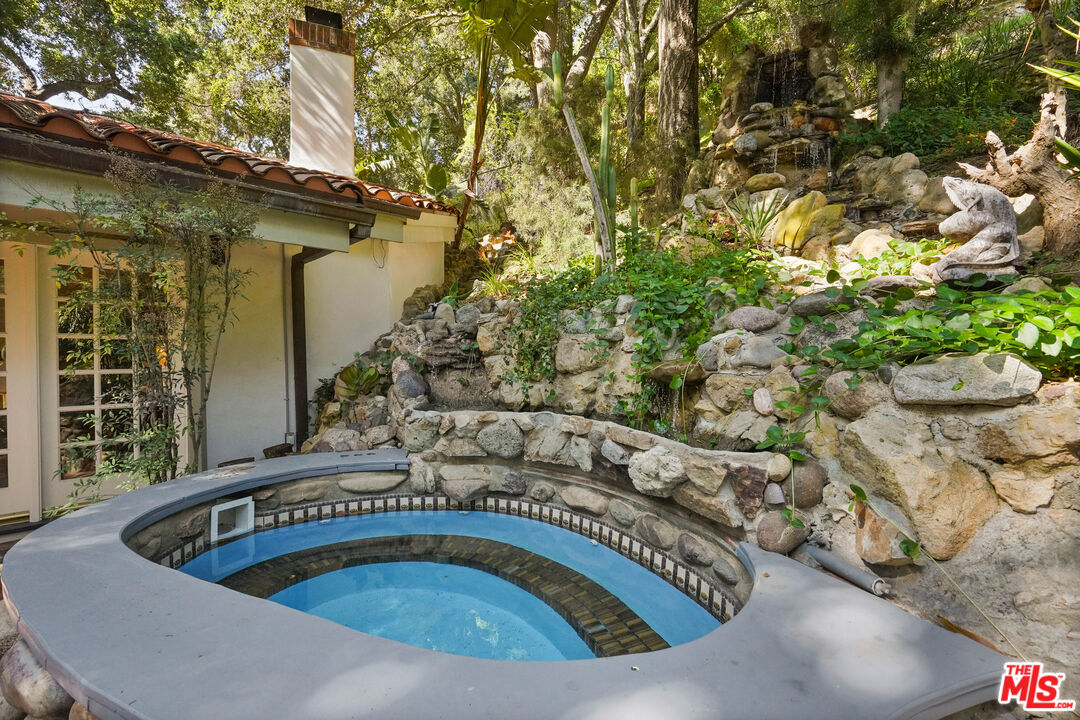 964 Old Topanga Canyon Road Topanga, CA 90290 - Photo 24 of 75 a view of swimming pool having outdoor seating