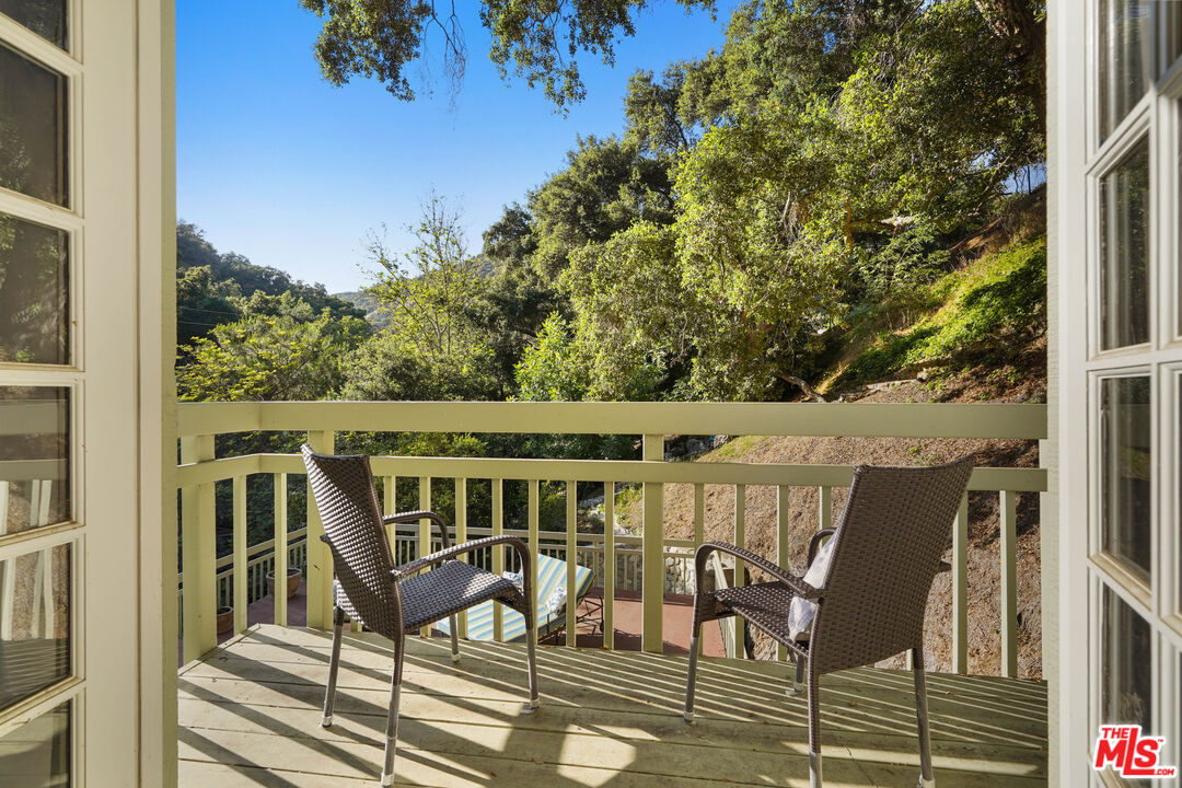 964 Old Topanga Canyon Road Topanga, CA 90290 - Photo 38 of 75 a view of a chairs and table on the terrace