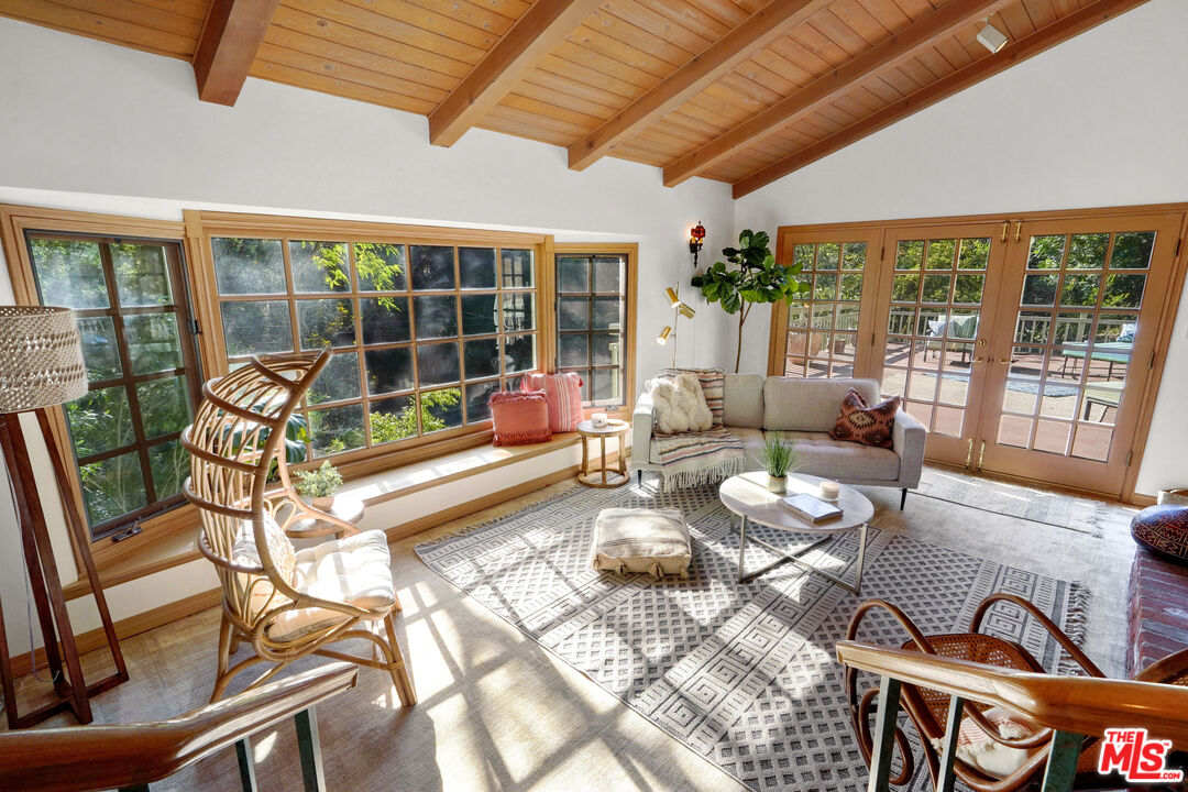 964 Old Topanga Canyon Road Topanga, CA 90290 - Photo 4 of 75 a living room with furniture and a large window