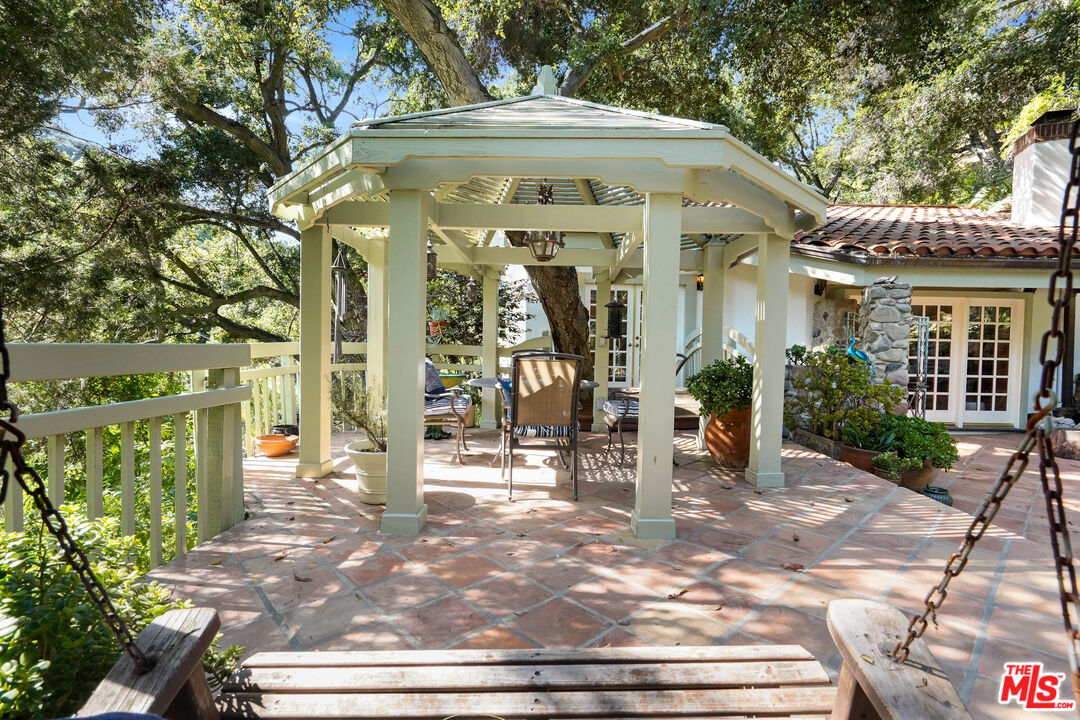 964 Old Topanga Canyon Road Topanga, CA 90290 - Photo 46 of 75 a front view of a house with a porch