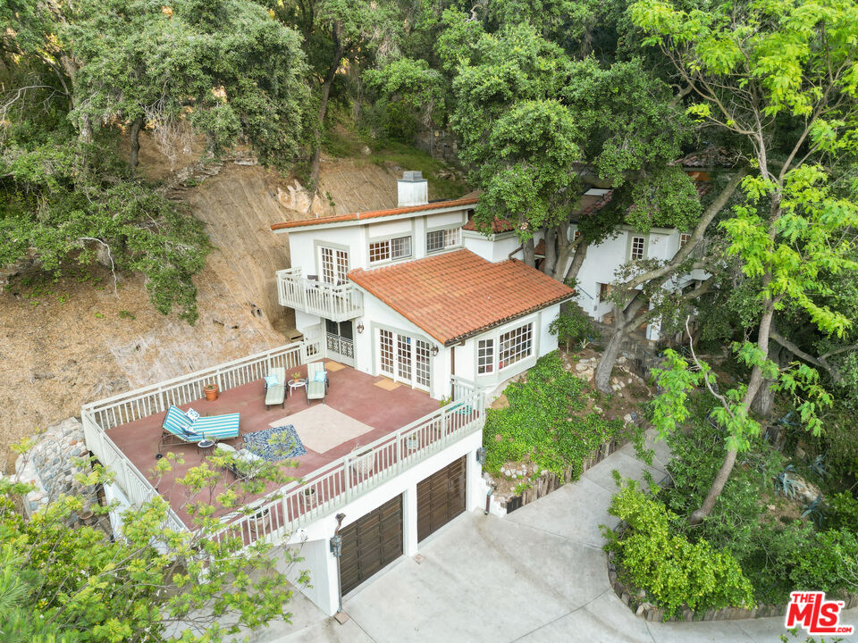 964 Old Topanga Canyon Road Topanga, CA 90290 - Photo 55 of 75 an aerial view of a house with a swimming pool