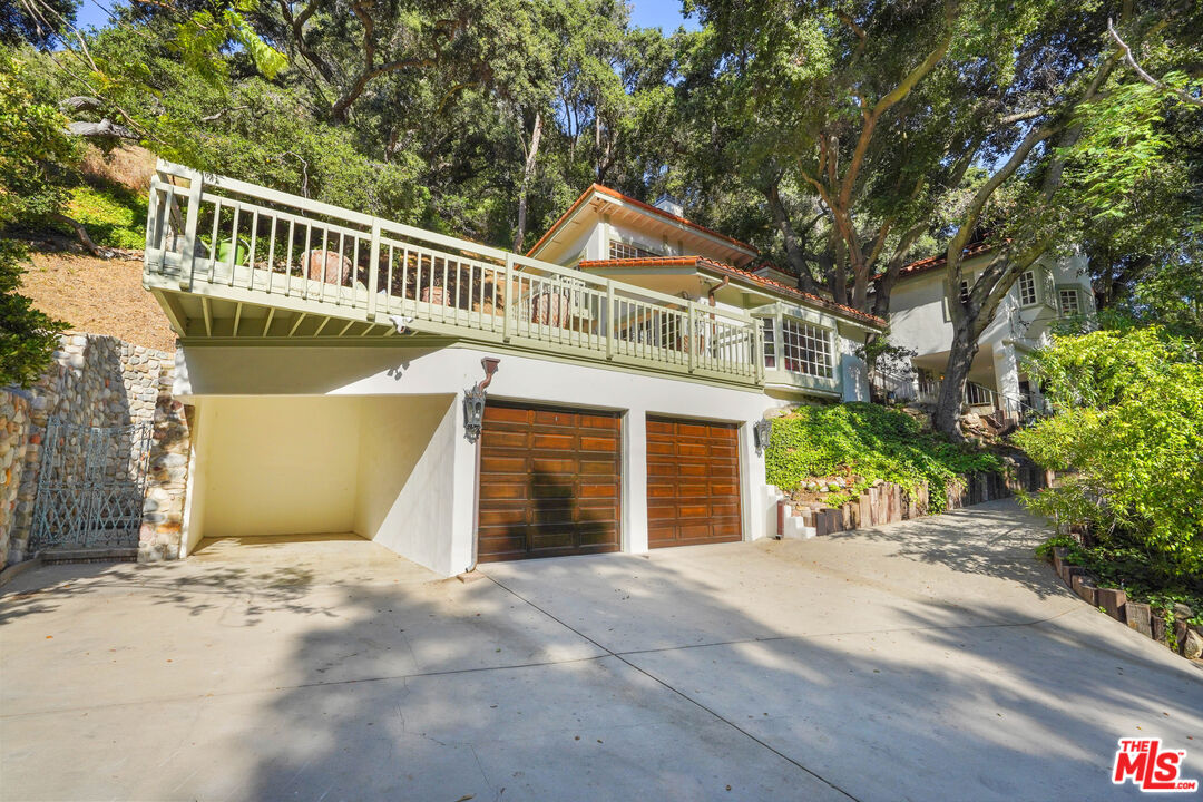 964 Old Topanga Canyon Road Topanga, CA 90290 - Photo 56 of 75 front view of a house with a yard