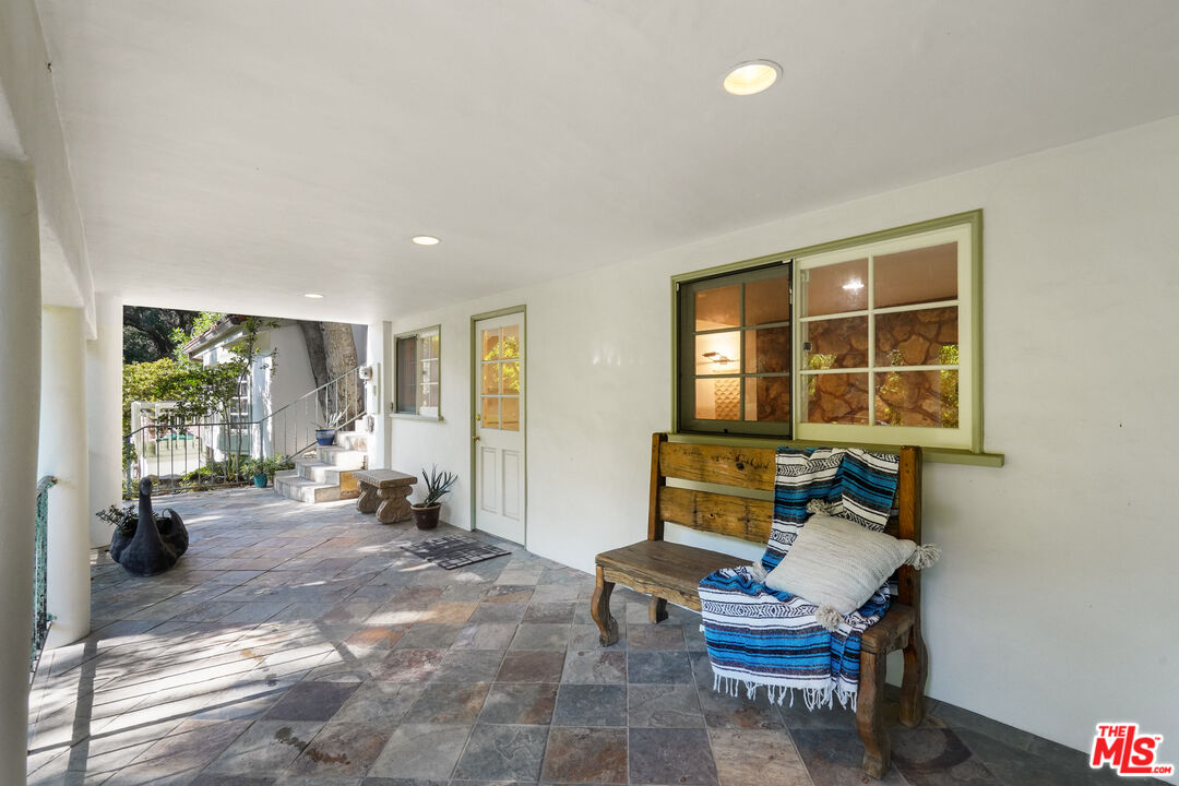 964 Old Topanga Canyon Road Topanga, CA 90290 - Photo 66 of 75 a living room with furniture and a window