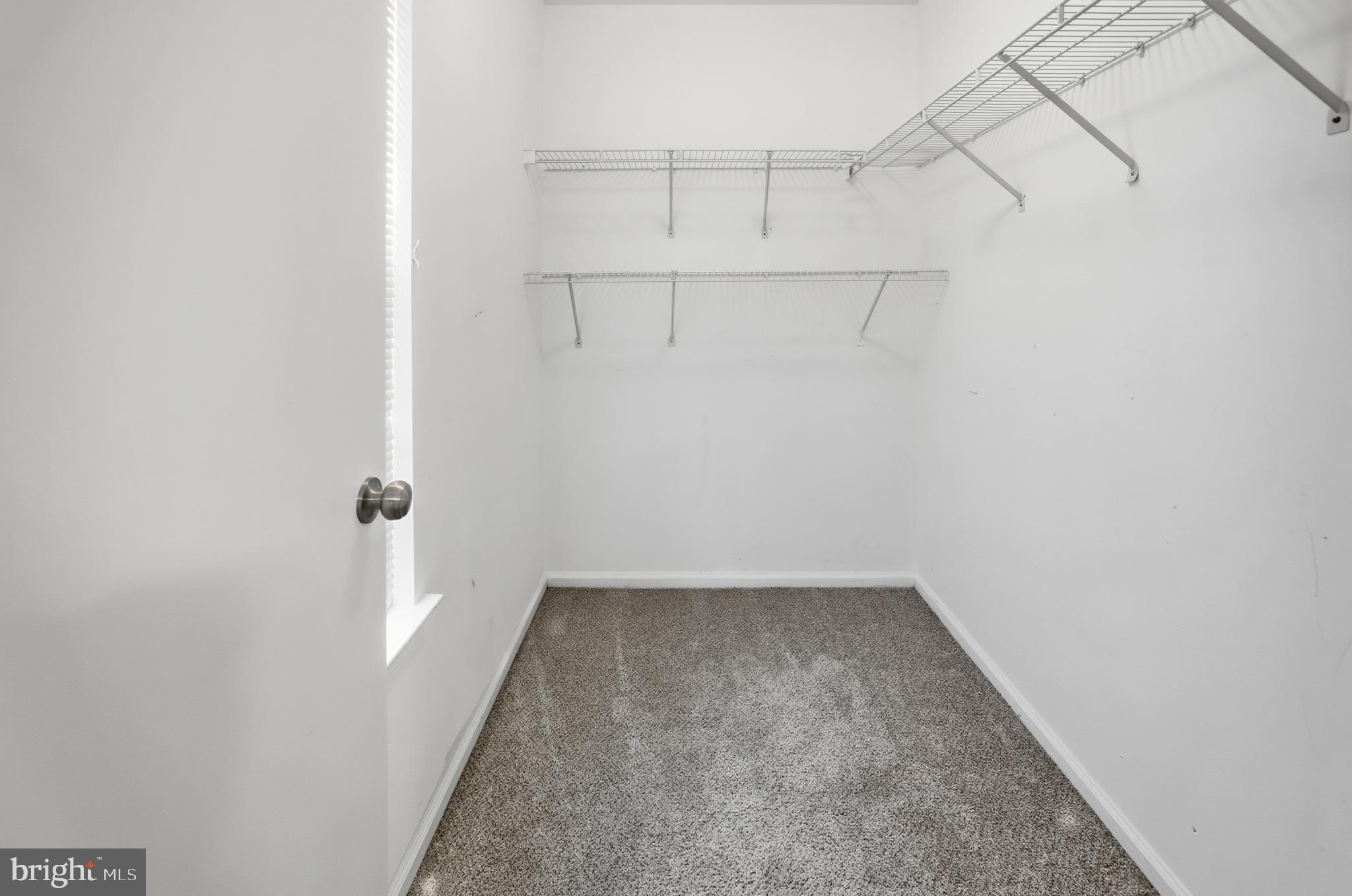 1401 Wharton Road Mount Laurel, NJ 08054 - Photo 22 of 40 a view of a room with racks on the wall