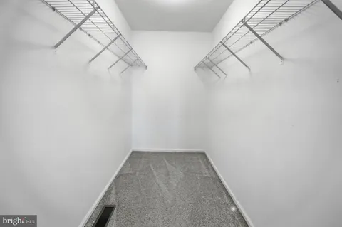 a view of small space with racks on the wall