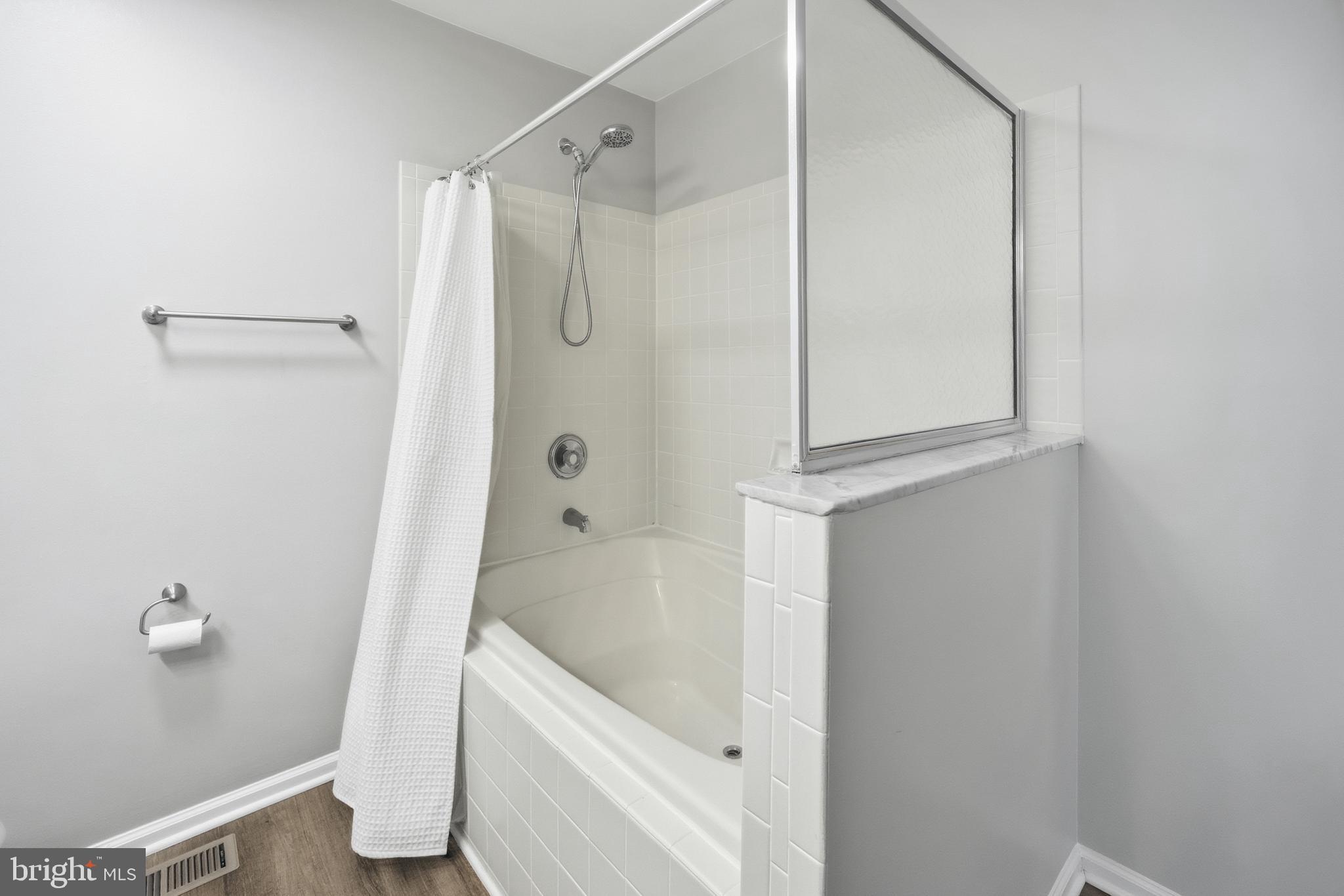 1401 Wharton Road Mount Laurel, NJ 08054 - Photo 30 of 40 a bathroom with a bathtub and a shower