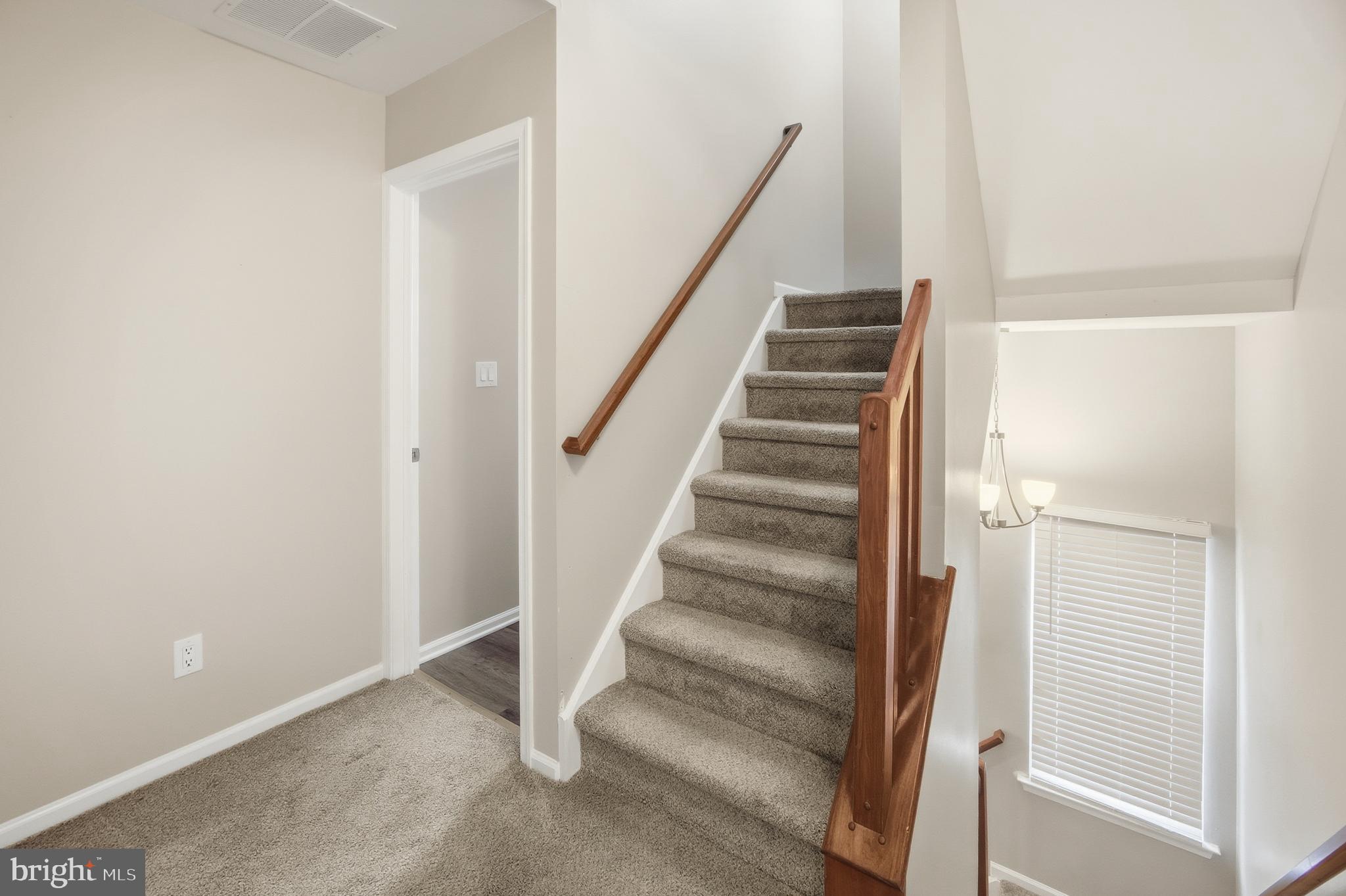 1401 Wharton Road Mount Laurel, NJ 08054 - Photo 32 of 40 a view of staircase with wooden floor and white walls