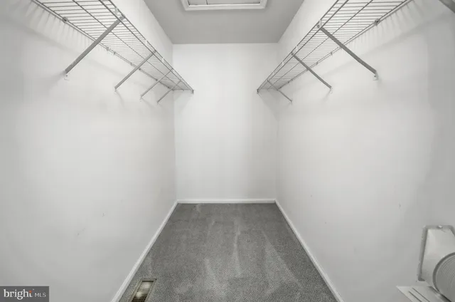 a view of a room with racks on the wall