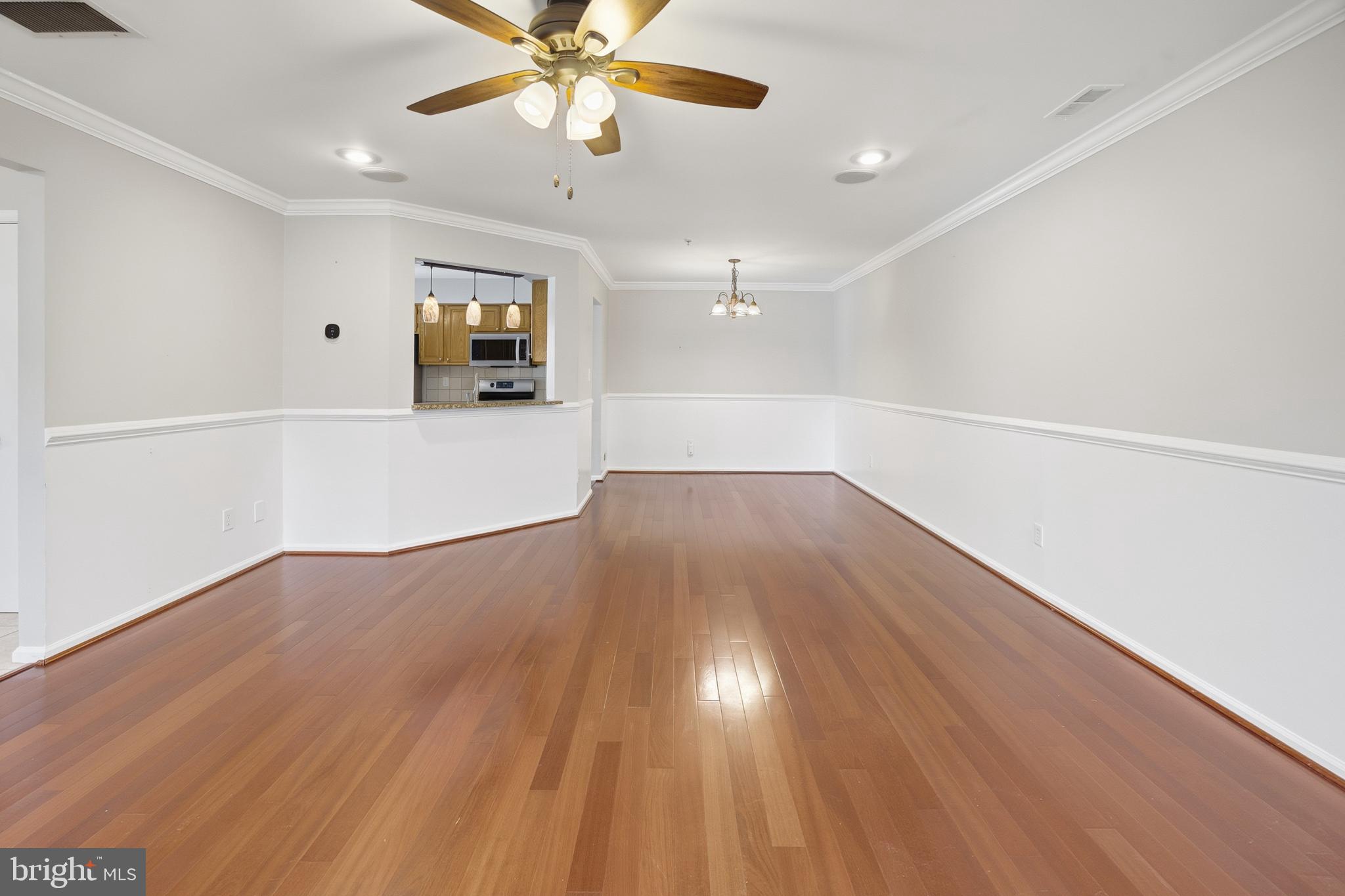 1401 Wharton Road Mount Laurel, NJ 08054 - Photo 7 of 40 an empty room with wooden floor and windows