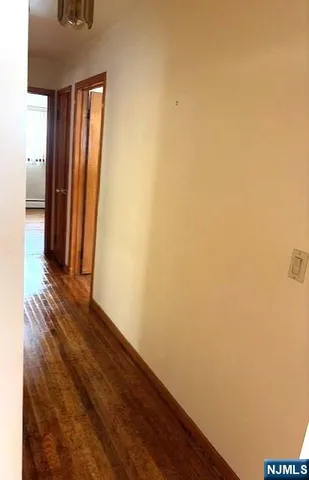 a kitchen with stainless steel appliances a refrigerator and a stove