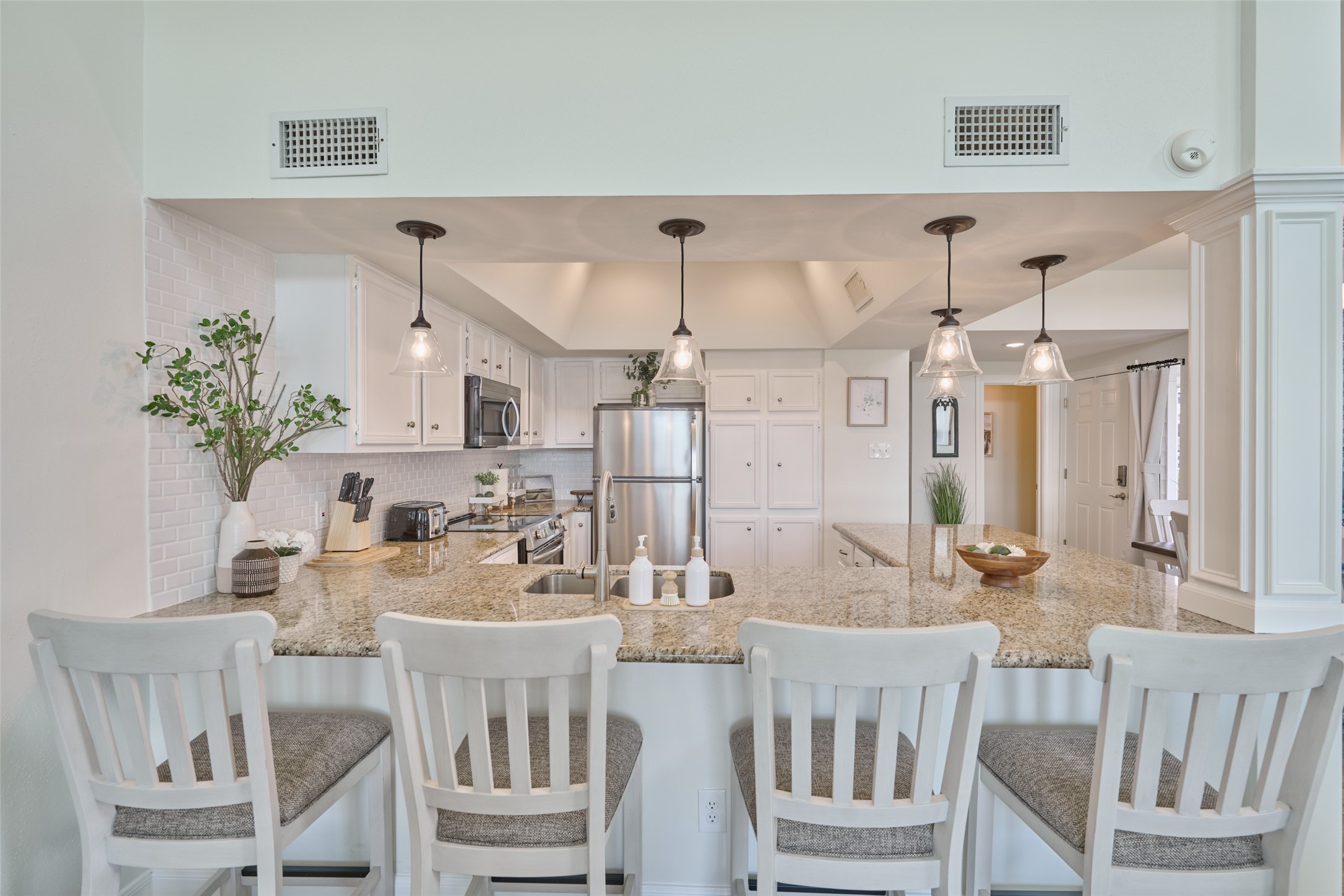 73 April Point Drive South Montgomery, TX 77356 - Photo 15 of 42 Completely updated kitchen with breakfast bar for extra seating.
