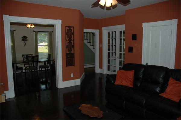 126 Mammoth Road Lowell, MA 01854 - Photo 11 of 23 a living room with furniture and a lamp