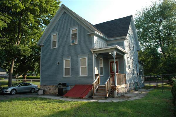 126 Mammoth Road Lowell, MA 01854 - Photo 2 of 23 a view of a house with backyard