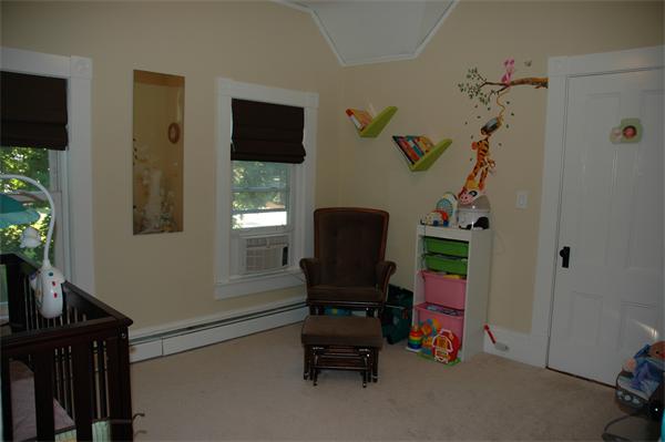 126 Mammoth Road Lowell, MA 01854 - Photo 21 of 23 a view of a workspace with furniture and a window