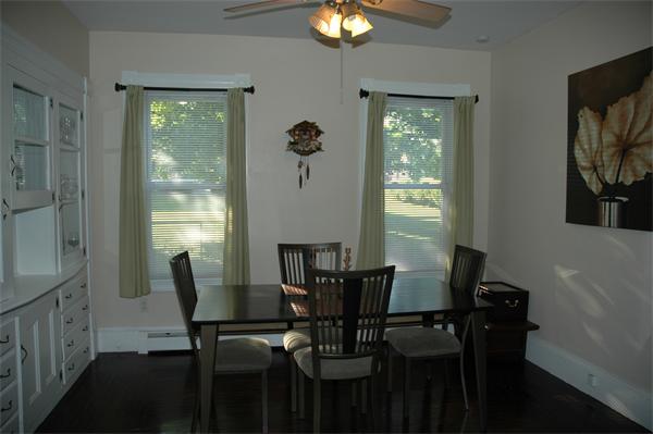 126 Mammoth Road Lowell, MA 01854 - Photo 9 of 23 a view of a dining room with furniture and a window