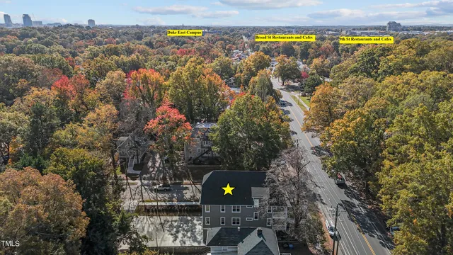 an outdoor space with lots of car parked