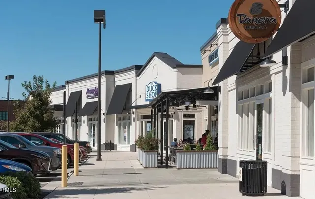 a view of street with sitting area