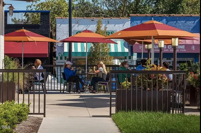 a view of a car park in front of a building