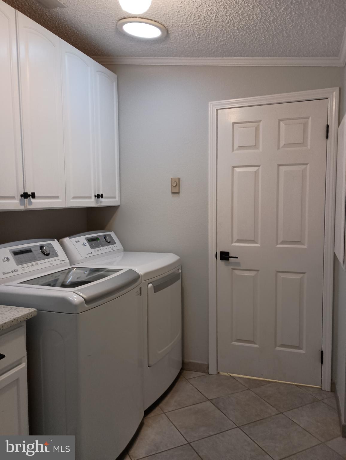 32217 Sandpiper Drive Lewes, DE 19958 - Photo 19 of 21 a utility room with a sink