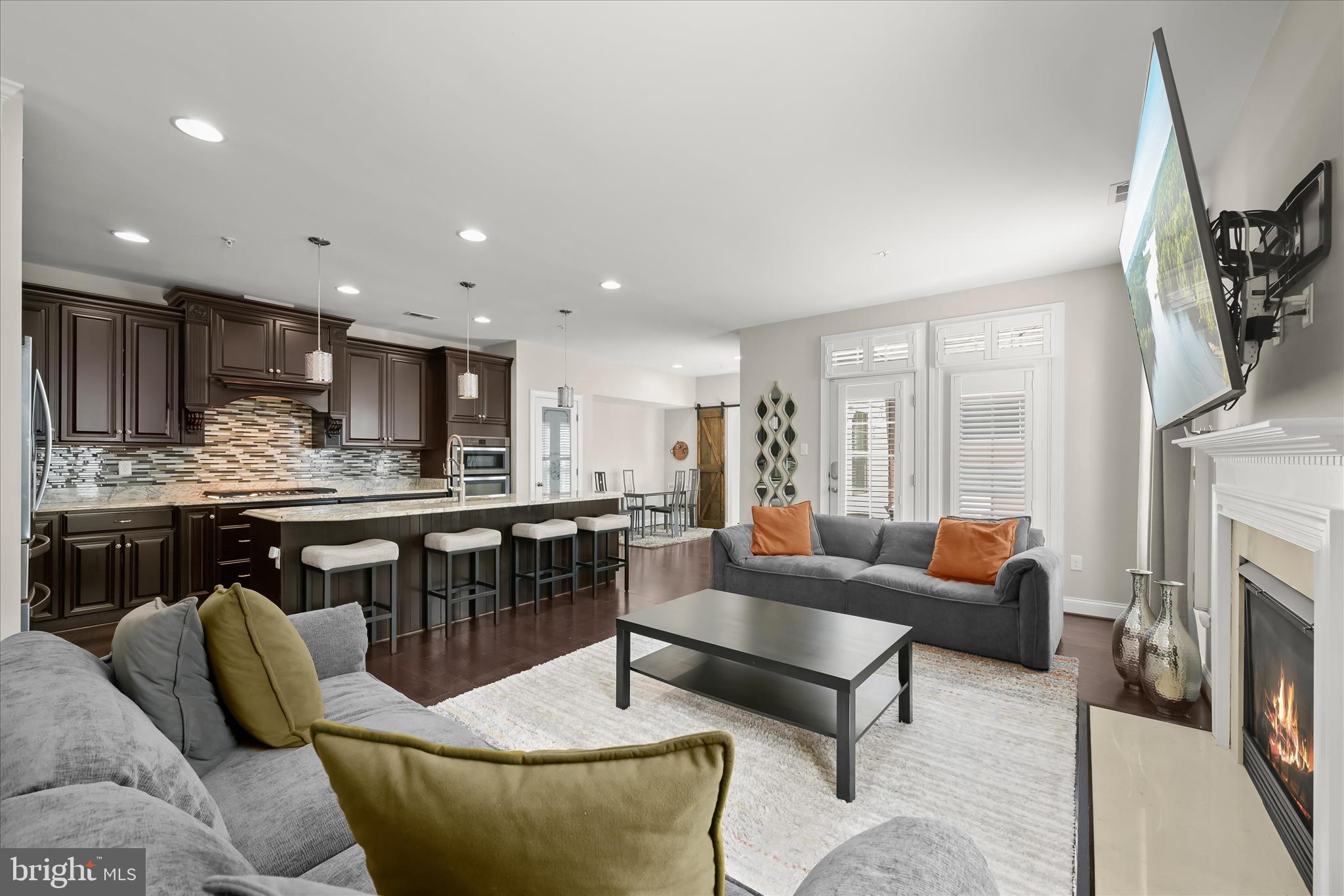 11295 Market Street Fulton, MD 20759 - Photo 20 of 62 a living room with fireplace furniture and a fireplace