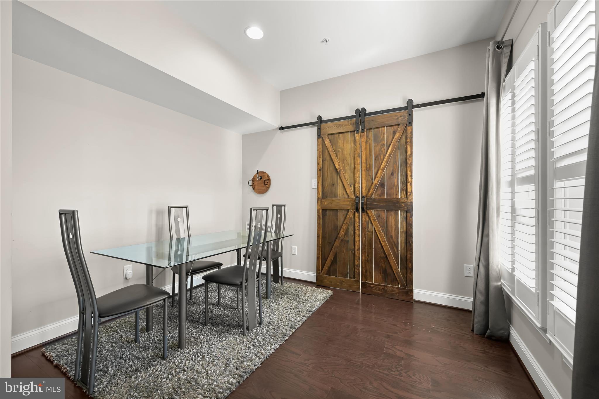 11295 Market Street Fulton, MD 20759 - Photo 26 of 62 a dining room with furniture and a floor to ceiling window