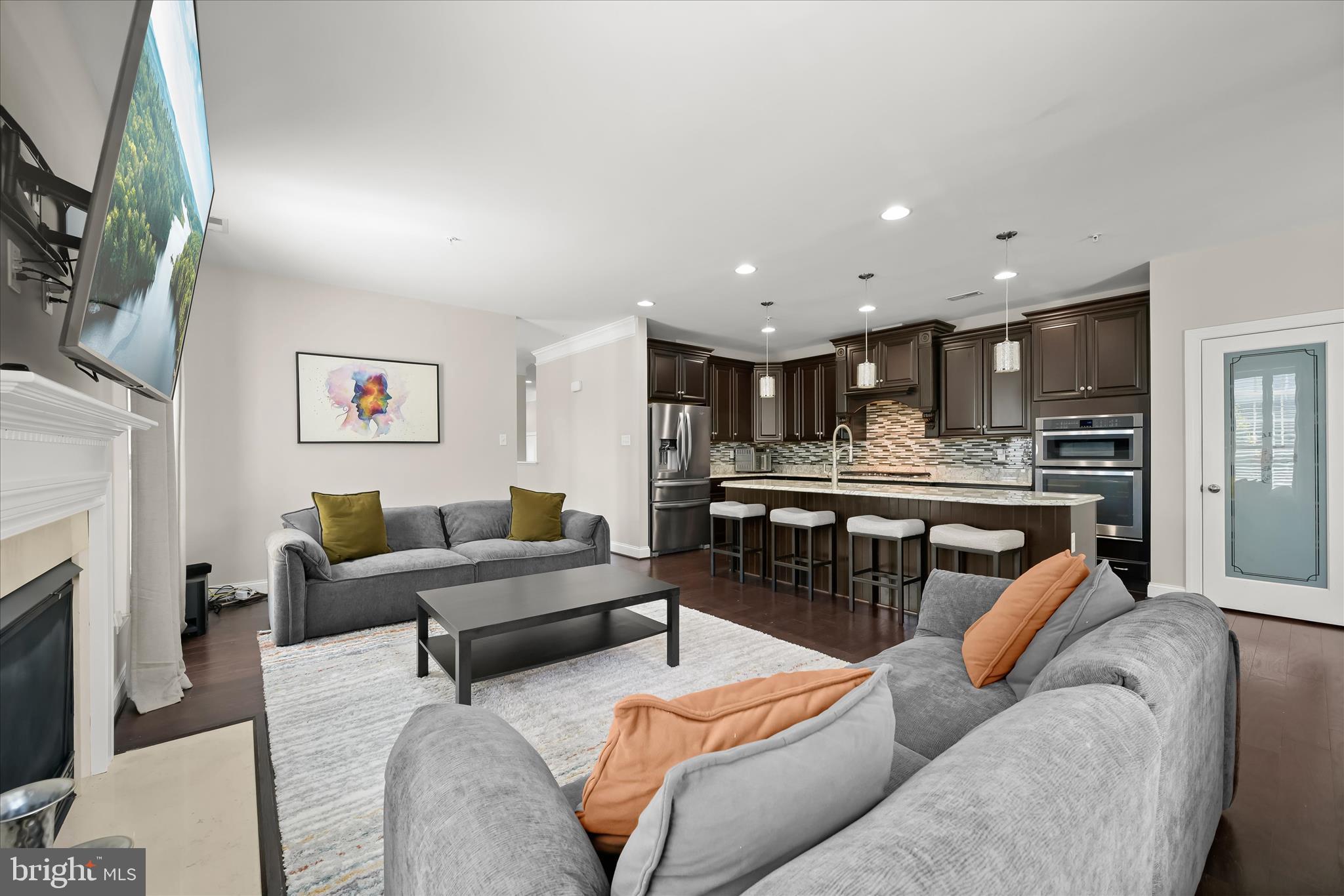 11295 Market Street Fulton, MD 20759 - Photo 62 of 62 a living room with furniture and a fireplace