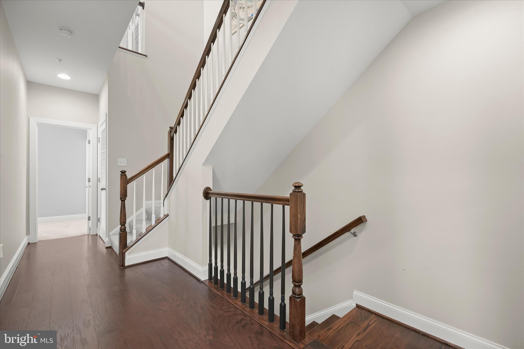 11295 Market Street Fulton, MD 20759 - Photo 36 of 62 a view of staircase with railing and white walls