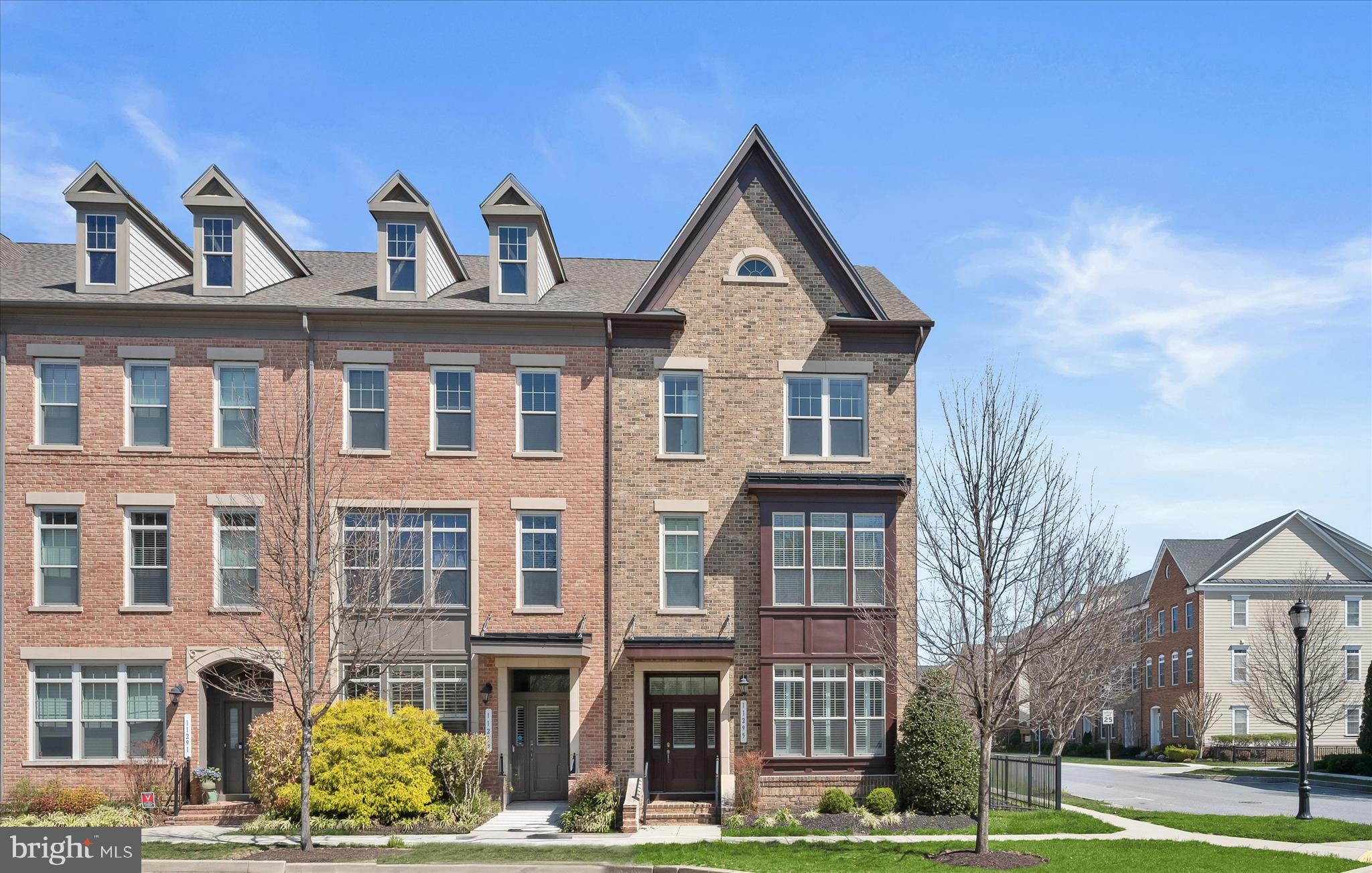 11295 Market Street Fulton, MD 20759 - Photo 4 of 62 a view of a brick house with many windows