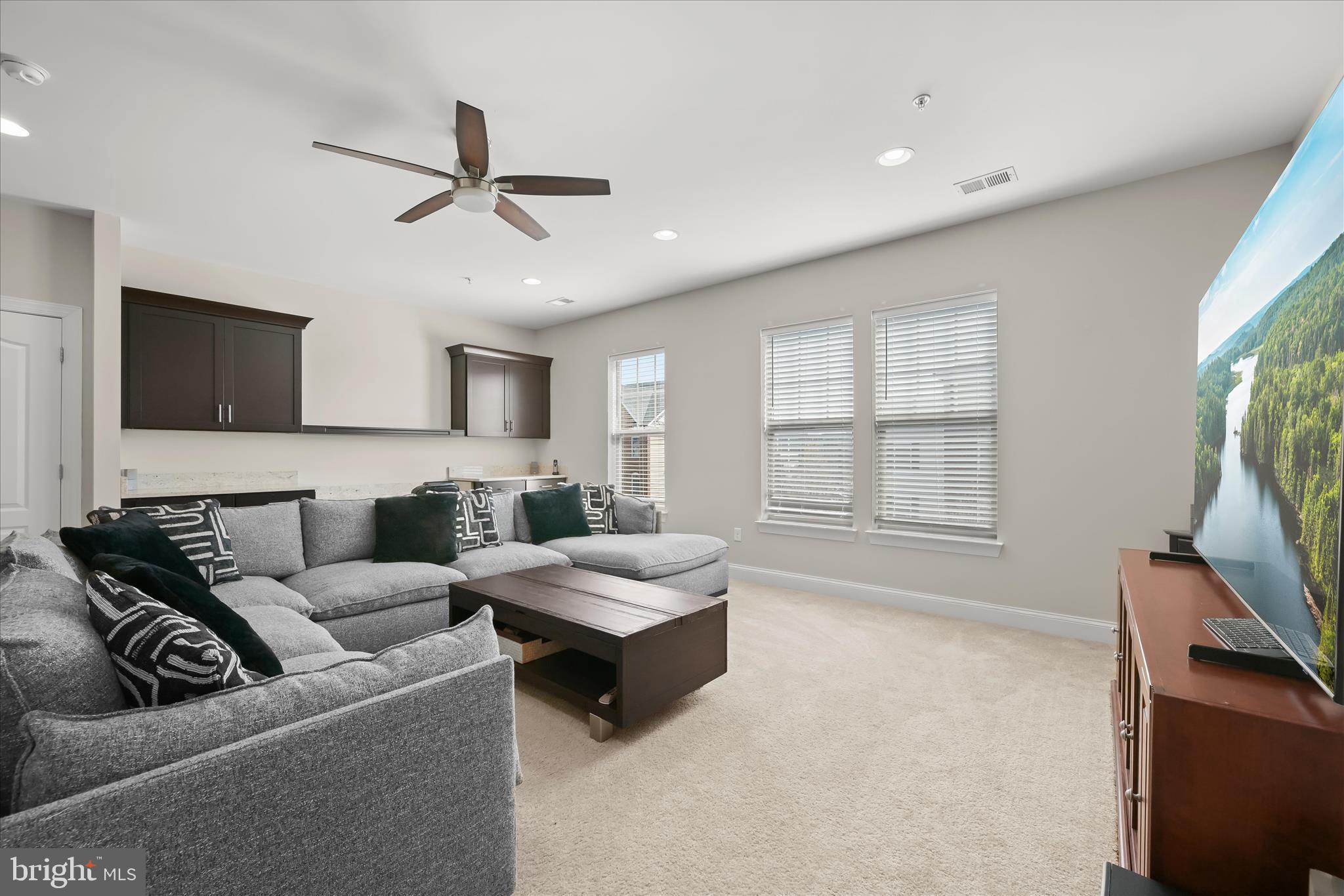 11295 Market Street Fulton, MD 20759 - Photo 41 of 62 a living room with furniture and a flat screen tv