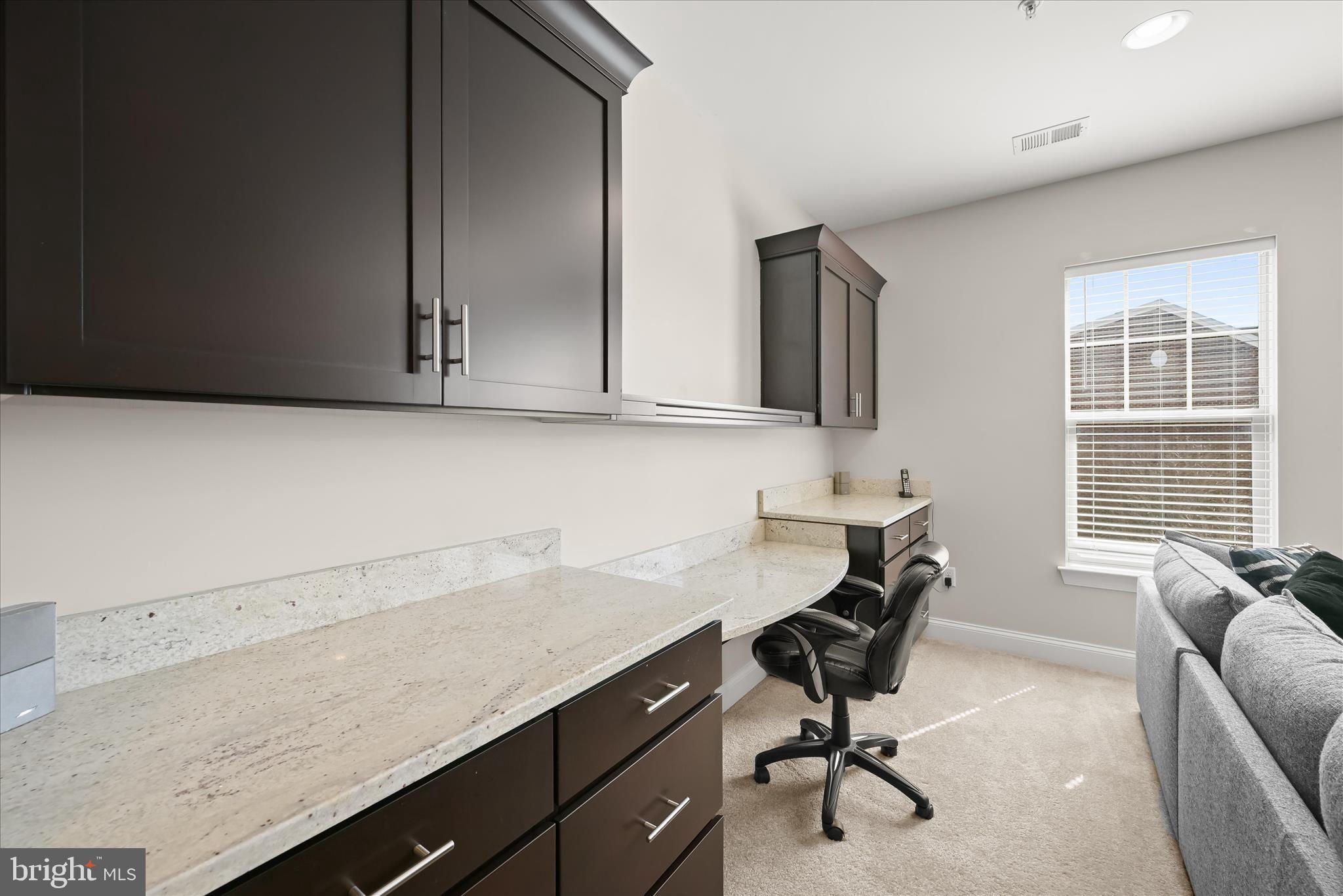 11295 Market Street Fulton, MD 20759 - Photo 43 of 62 a view of workspace with wooden floor windows cabinet and chair