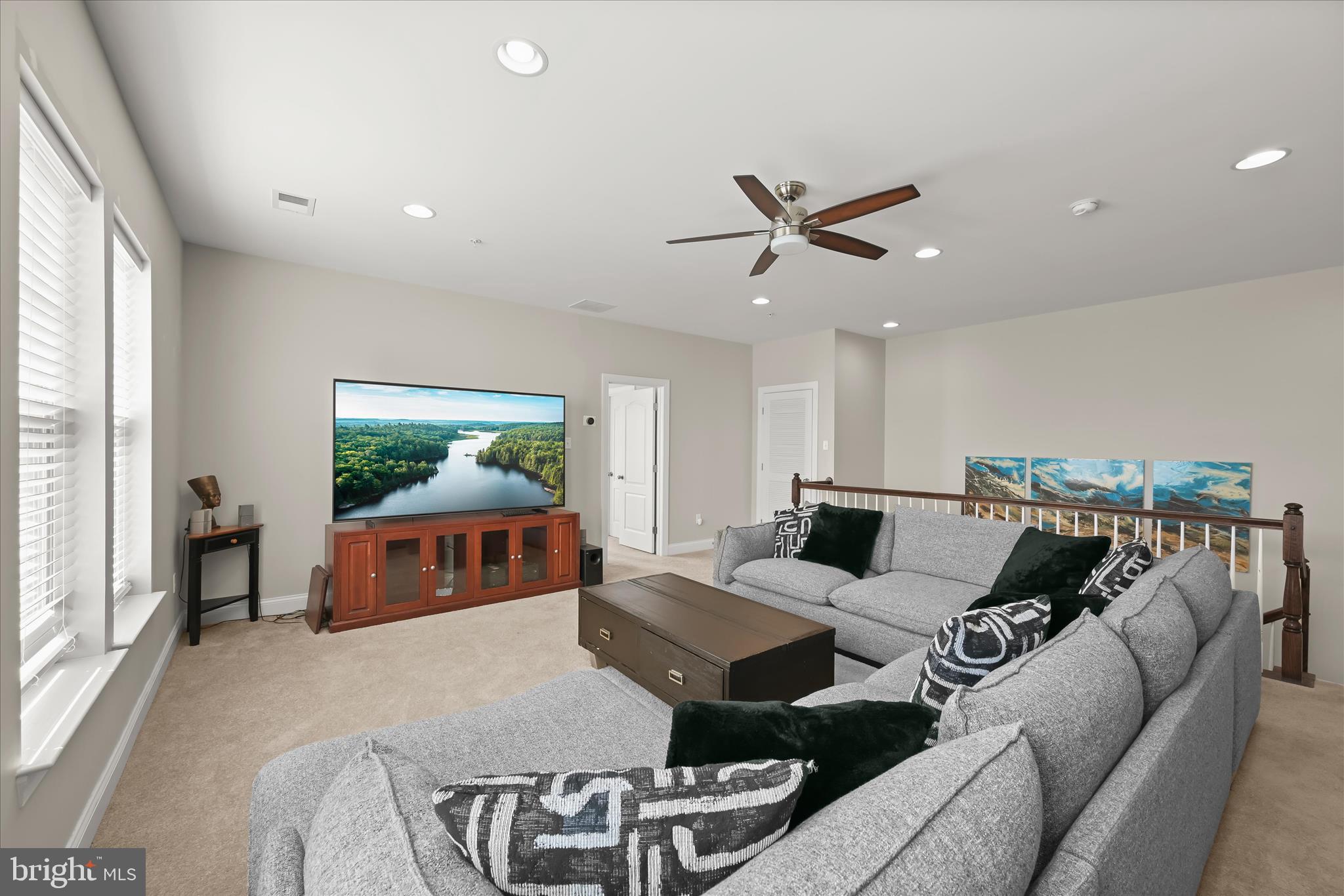 11295 Market Street Fulton, MD 20759 - Photo 44 of 62 a living room with furniture and a flat screen tv