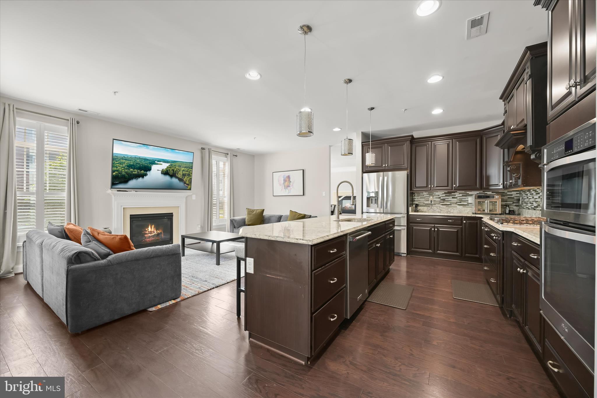 11295 Market Street Fulton, MD 20759 - Photo 5 of 62 a kitchen with a stove top oven and refrigerator