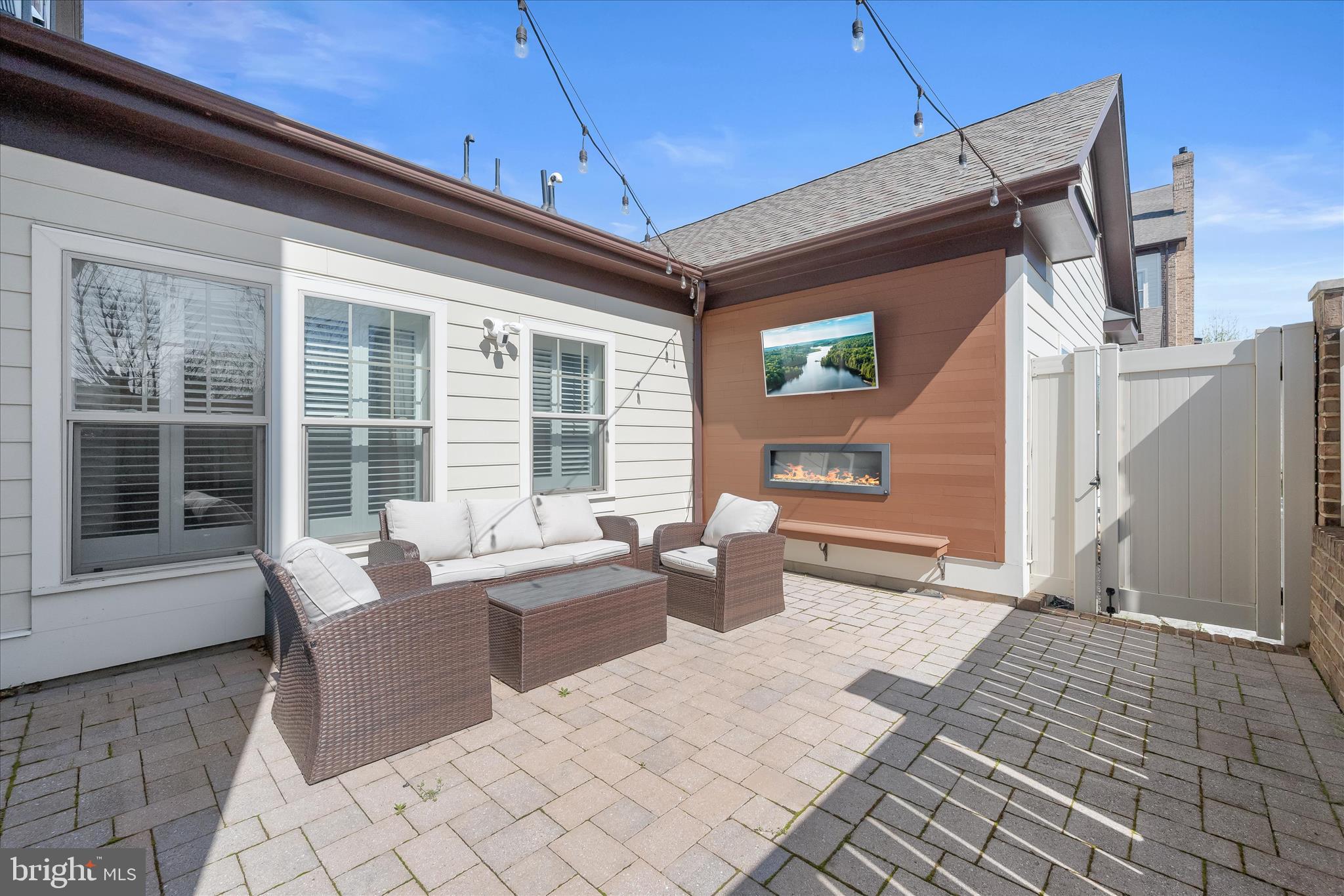 11295 Market Street Fulton, MD 20759 - Photo 49 of 59 Private patio with wall mounted fireplace