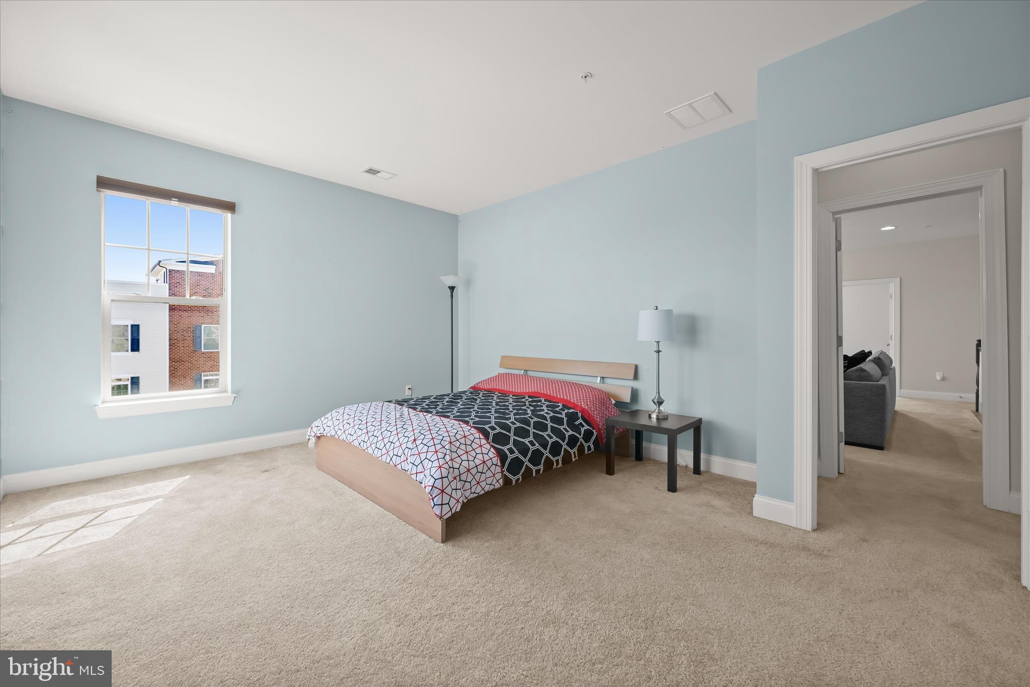 11295 Market Street Fulton, MD 20759 - Photo 50 of 62 a bedroom with a bed and a cabinets