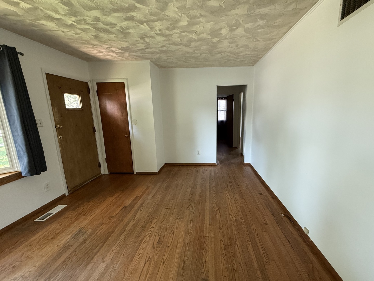 29 Roslyn Road Westmont, IL 60559 - Photo 3 of 11 a view of a room with wooden floor and stairs