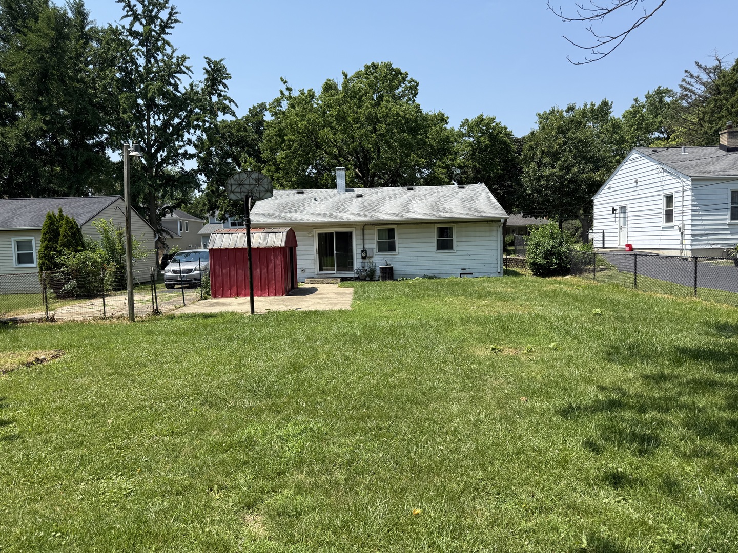 29 Roslyn Road Westmont, IL 60559 - Photo 10 of 11 a view of a house with a backyard porch and sitting area