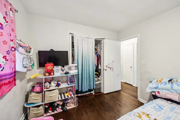 a room with toys and wooden floor
