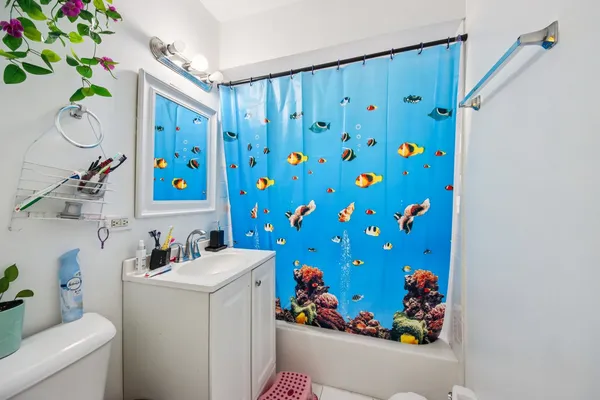 a room with toys and a large window