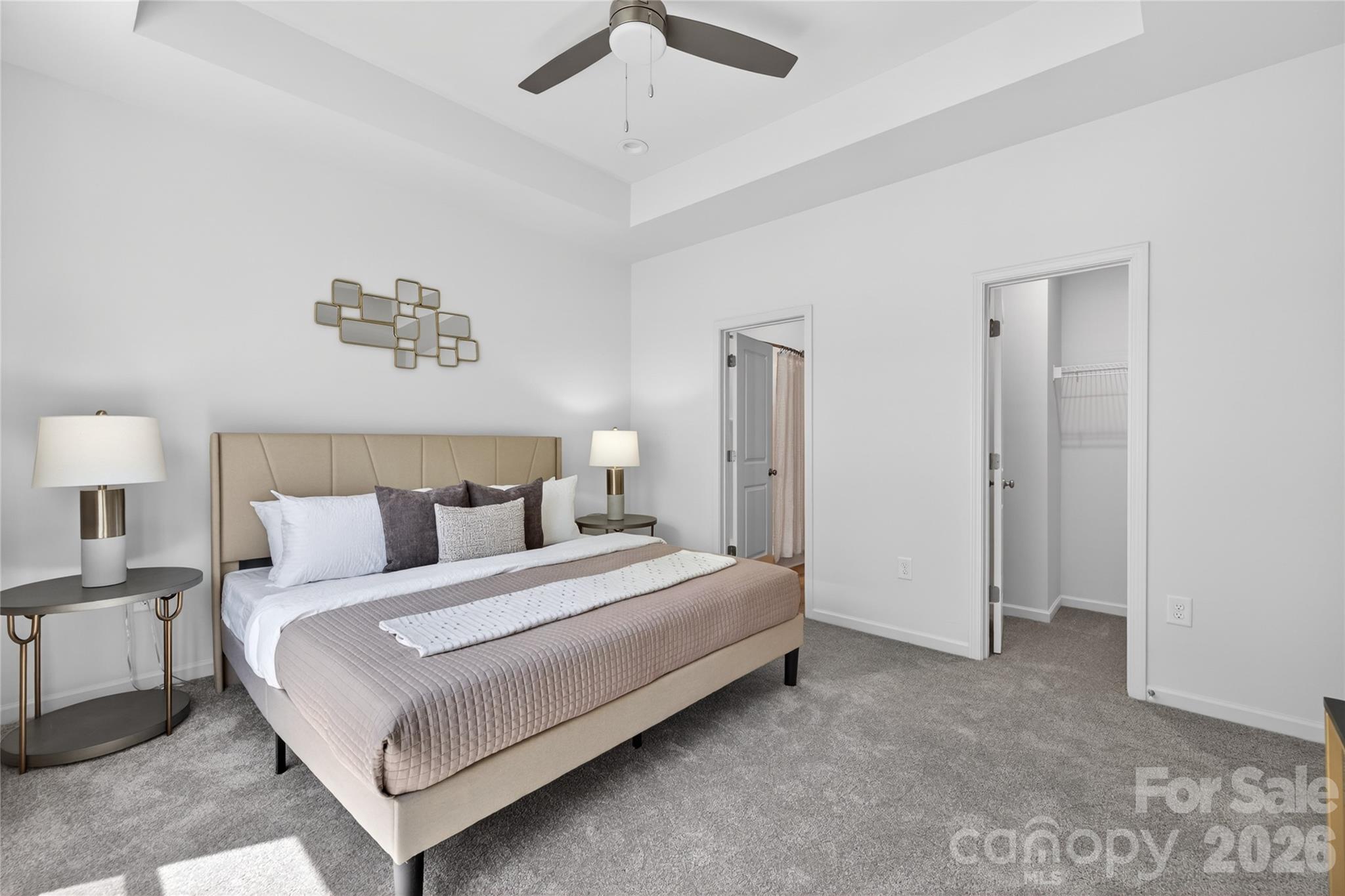 9212 Moores Chapel Road Charlotte, NC 28214 - Photo 12 of 23 a bedroom with a bed and a night stand