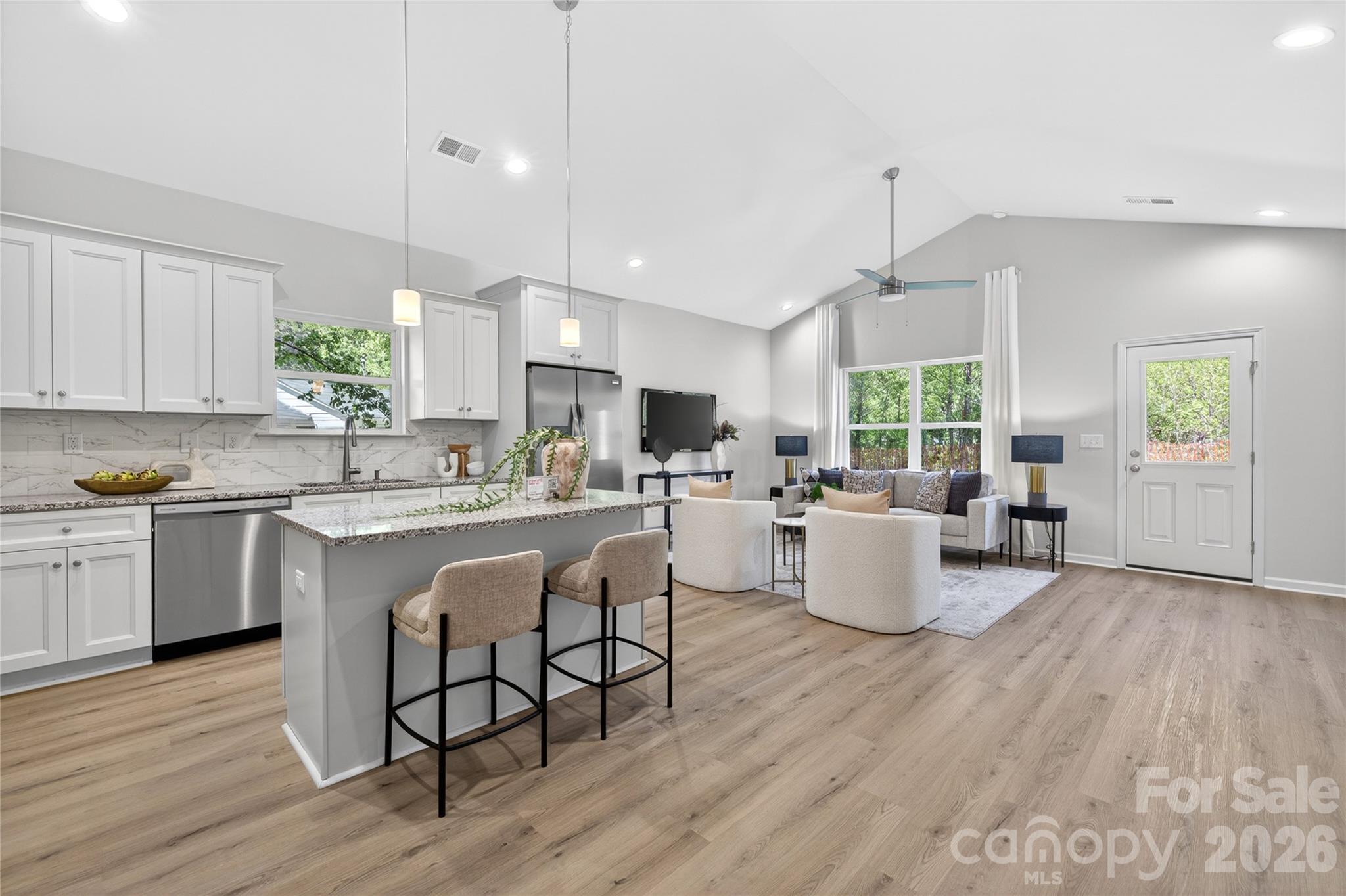 9212 Moores Chapel Road Charlotte, NC 28214 - Photo 3 of 23 a kitchen with living room and living room