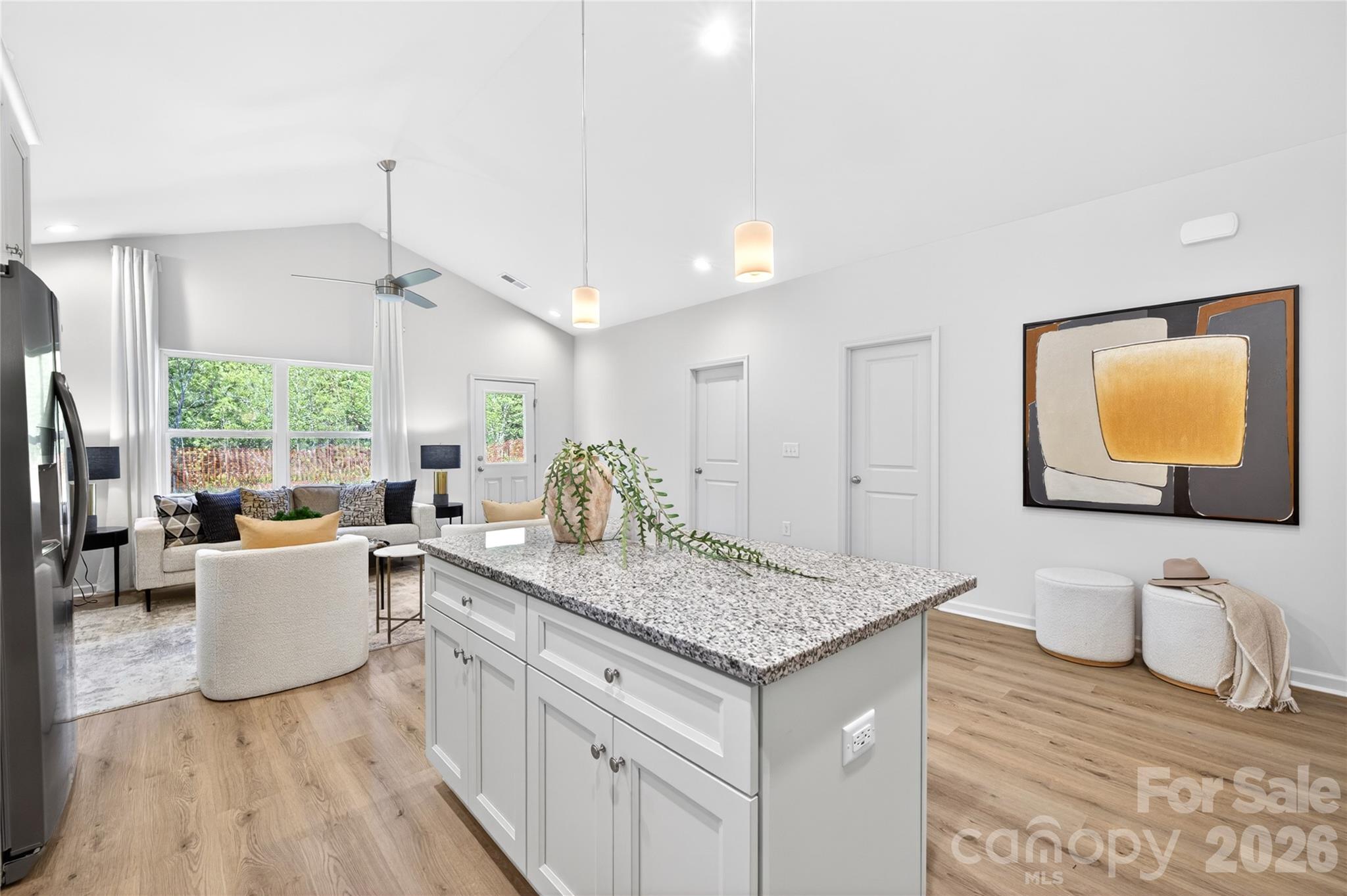 9212 Moores Chapel Road Charlotte, NC 28214 - Photo 7 of 23 a view of living room with granite countertop couches with wooden floor